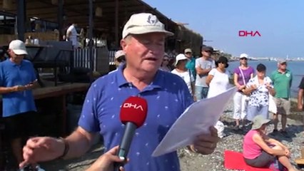 Güzelbahçe’de yurttaşlar “Sahiller halkındır” diyerek havlu bıraktı