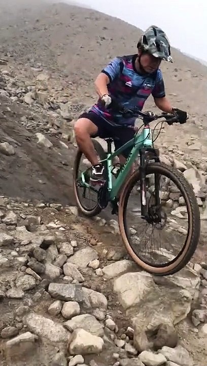 Mountain Biker Falls Down Rocky Slope