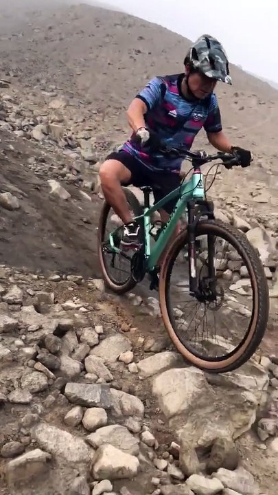 Mountain Biker Falls Down Rocky Slope