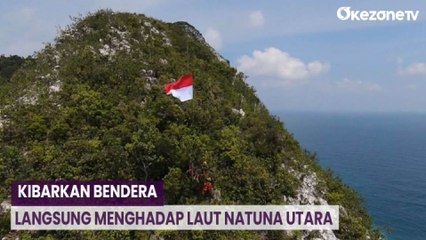 Basarnas Natuna Kibarkan Bendera Merah Putih Raksasa di Tebing Setinggi 200 Meter