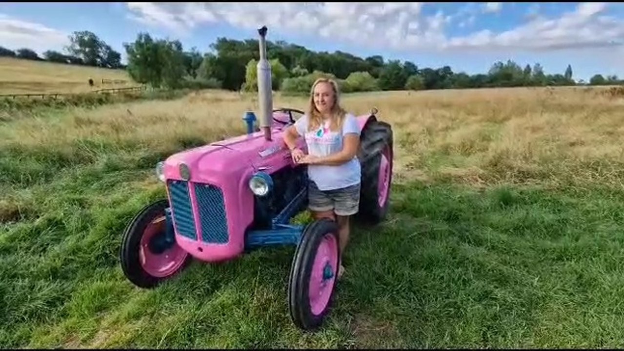 Anna Griffiths with her pink Fordson Dexta tractor