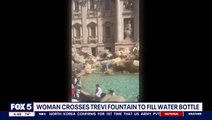 Moment Rome tourist scales Trevi Fountain to fill water bottle
