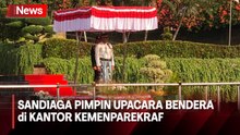 Gagah Berbusana Adat, Sandiaga Uno Pimpin Upacara Bendera di Kantor Kemenparekraf