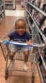 Kid Sitting Inside Shopping Cart Laughs Hysterically When Uncles Pushes Them