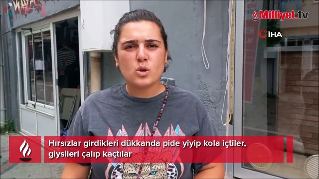 Hırsızlar girdikleri dükkanda pide yiyip kola içtiler, giysileri çalıp kaçtılar