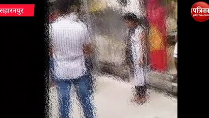 Hapur video पंचायत के फैसले पर युवती ने सरेआम युवक को चप्पलों से पीटा