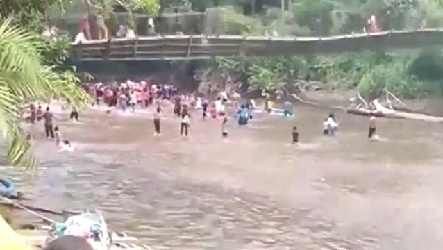 Suspension bridge collapses during duck catching contest, injuring 32