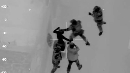 Armed police surround suspect ‘lit up like a Christmas tree’ hiding in wheelie bin