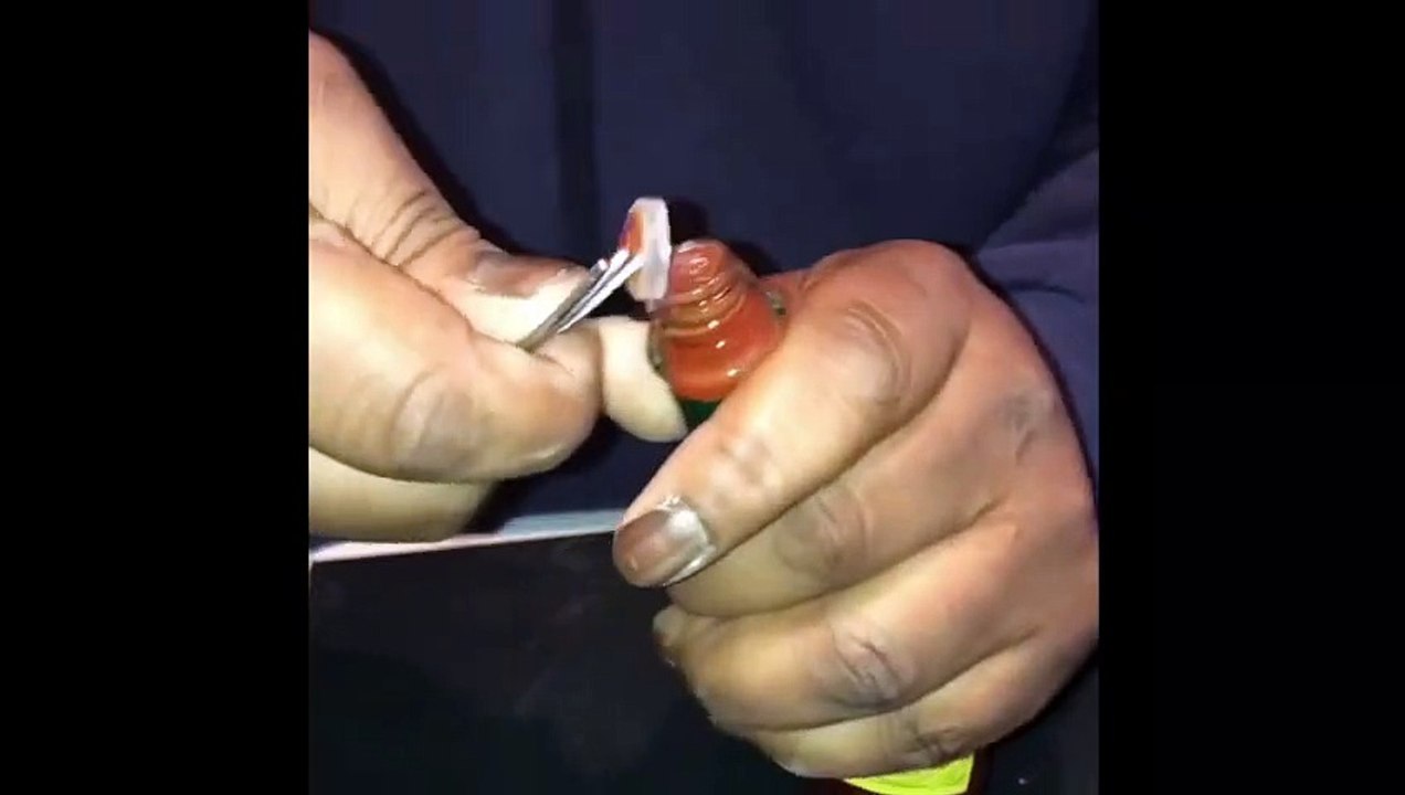 Angryoldhead drinking a bottle of Habanero Hot Souce