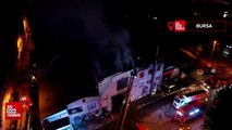 Bursa'da ahşap kapı fabrikasında çıkan yangına müdahale ediliyor