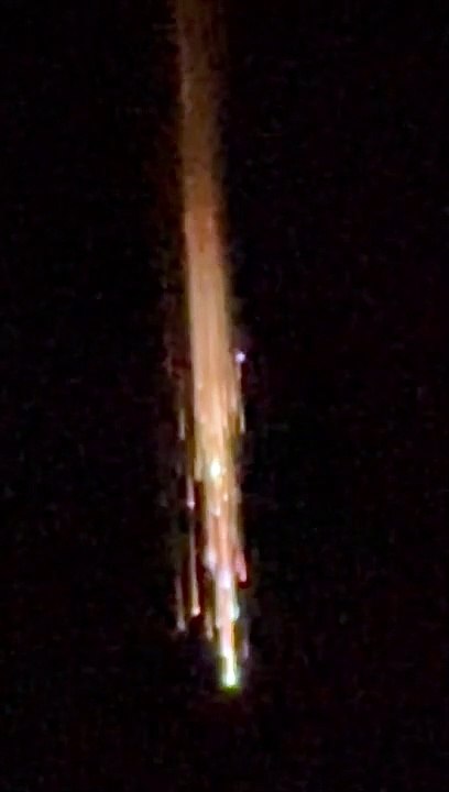 Space Debris Falling Through Atmosphere