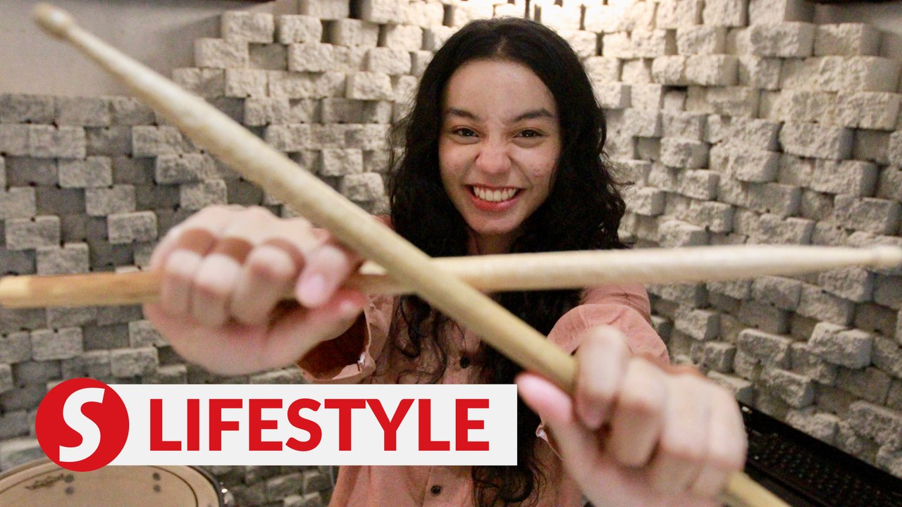 She's 17, and drums for Malaysian rock legends Search: 'Music is my life'