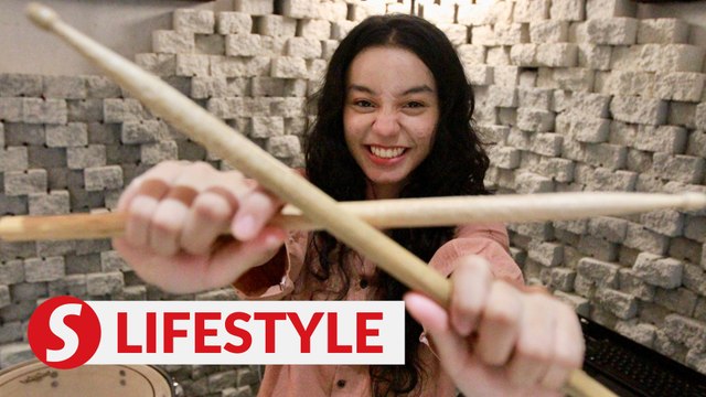 She's 17, and drums for Malaysian rock legends Search: 'Music is my life'