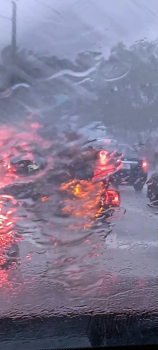 Biker In The Rain
