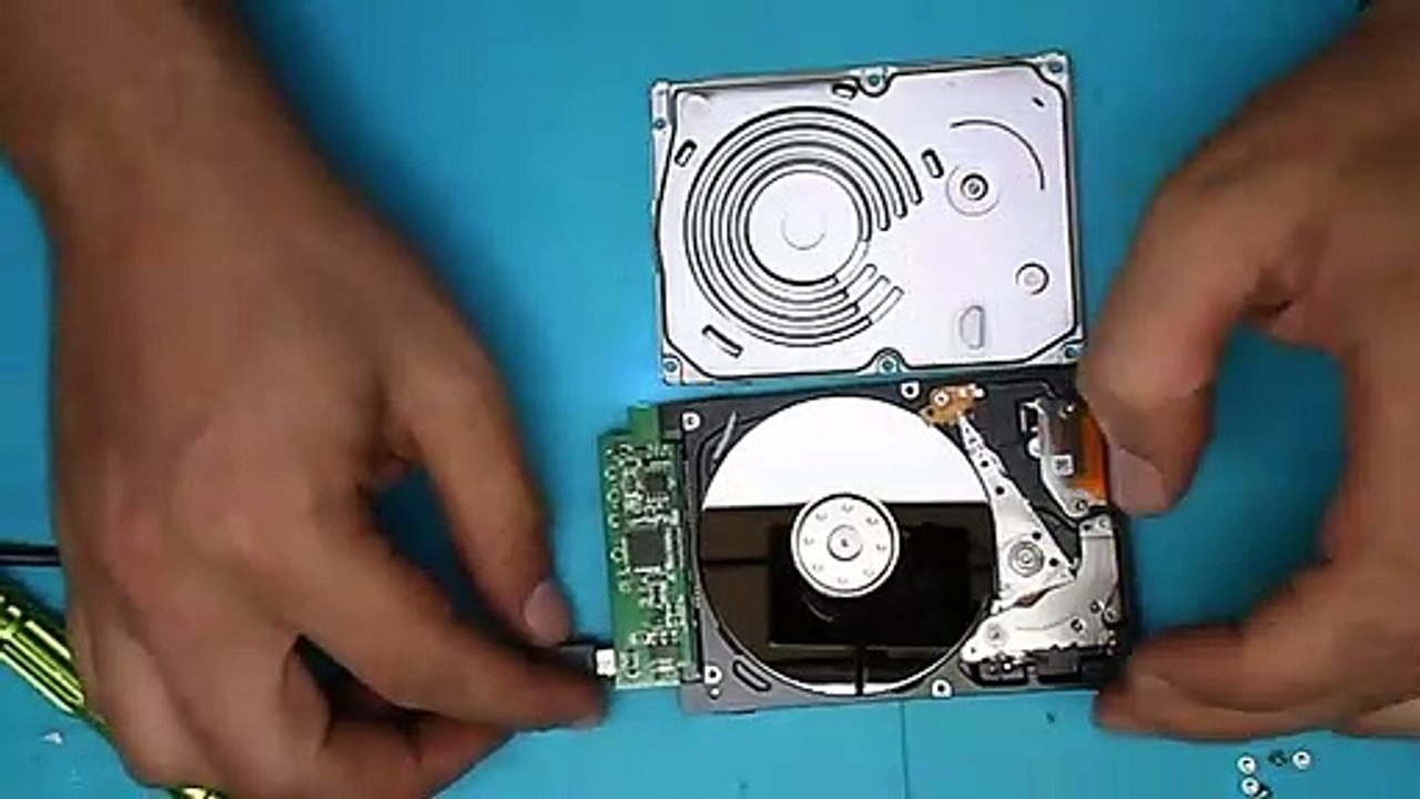 Hard disk drive components under pressure