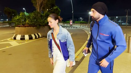 Ranbir, Alia pose for paps at airport; fans say 'both look upset'