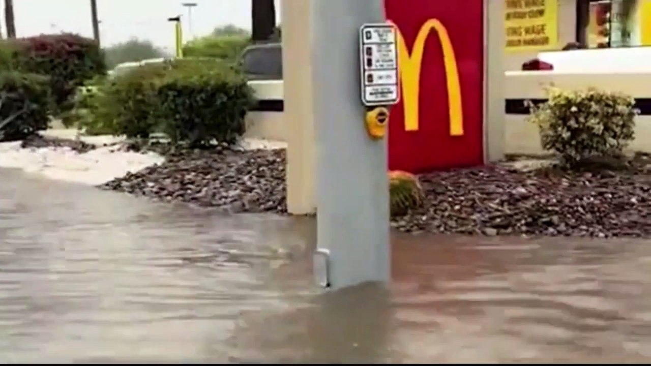 Tropical Storm Hilary leaves Cathedral City caked in MUD: Aftermath of torrential rain shows cars stuck in 2ft of sludge and hundreds trapped in their homes
