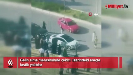 Gelin alma merasiminde çekici üzerindeki araçta lastik yaktılar