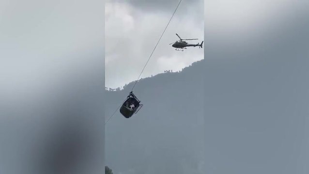 Moment Pakistan cable car rescue team winch child to safety captured in dramatic video footage