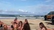 Dog Bites Sunbathing Woman Tourist at sea beach, watch what was happened next.