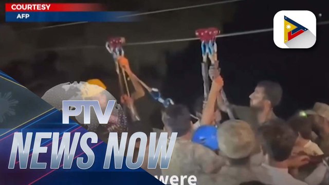 8 people rescued from dangling cable car 900 feet above a valley in Pakistan