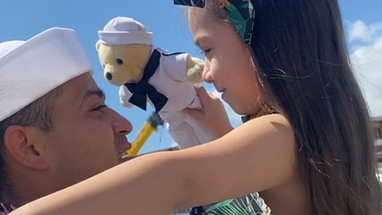Girl With Sailor Doll Reunites With Navy Dad After His Deployment