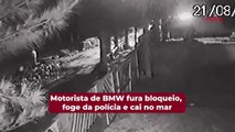 Motorista de BMW fura bloqueio, foge da polícia e cai no mar