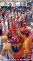 The idol of Sadguru Shree Aniruddha Bapu being brought on stage amid the sounds of Mangal-waadya.