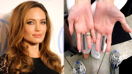 Angelina's Tattoo Artist Reacts To Speculation Her New Middle Finger Tattoos Are Brad Pitt-Related