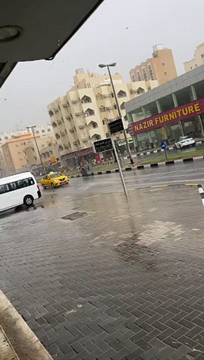 Garbage Drum Floats Down Street In Heavy Rain