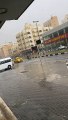 Garbage Drum Floats Down Street In Heavy Rain