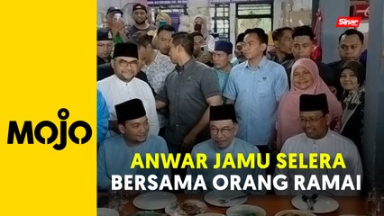 Hujan tidak halang PM jamu selera bersama orang ramai di Kempas