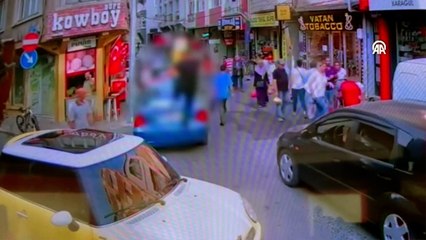 Darbettiği kişinin otomobiline zarar verdikten sonra kaçan zanlının görüntüleri güvenlik kamerasında
