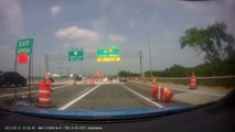 SUV Crashes Into Construction Cones While Trying to Exit Highway