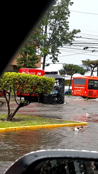 Water Tank Floats Down Flooded Street in Mexico