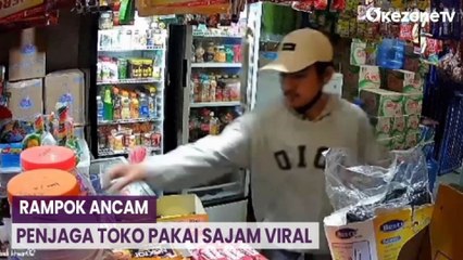 Video herunterladen: Aksi 2 Rampok dan Ancam Penjaga Toko Pakai Sajam Viral di Media Sosial