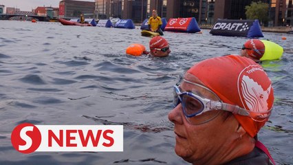 Swimmers take on Copenhagen harbour by night