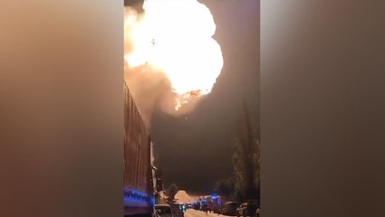 Flames engulf buildings as fire ravages Romanian petrol station in deadly explosion