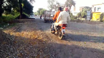 Fear of accident due to gravel filled in potholes on the highway