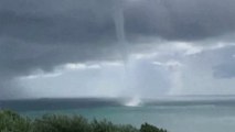 Watch: Rare waterspout swirls off Isle of Wight coast