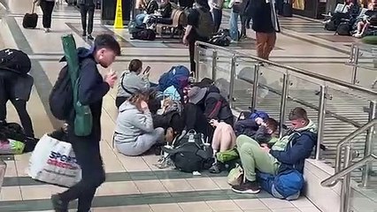 Leeds Festival revellers make the long journey home
