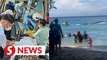 Two rescued, seven others swim ashore after boat capsizes in Pantai Teluk Batik