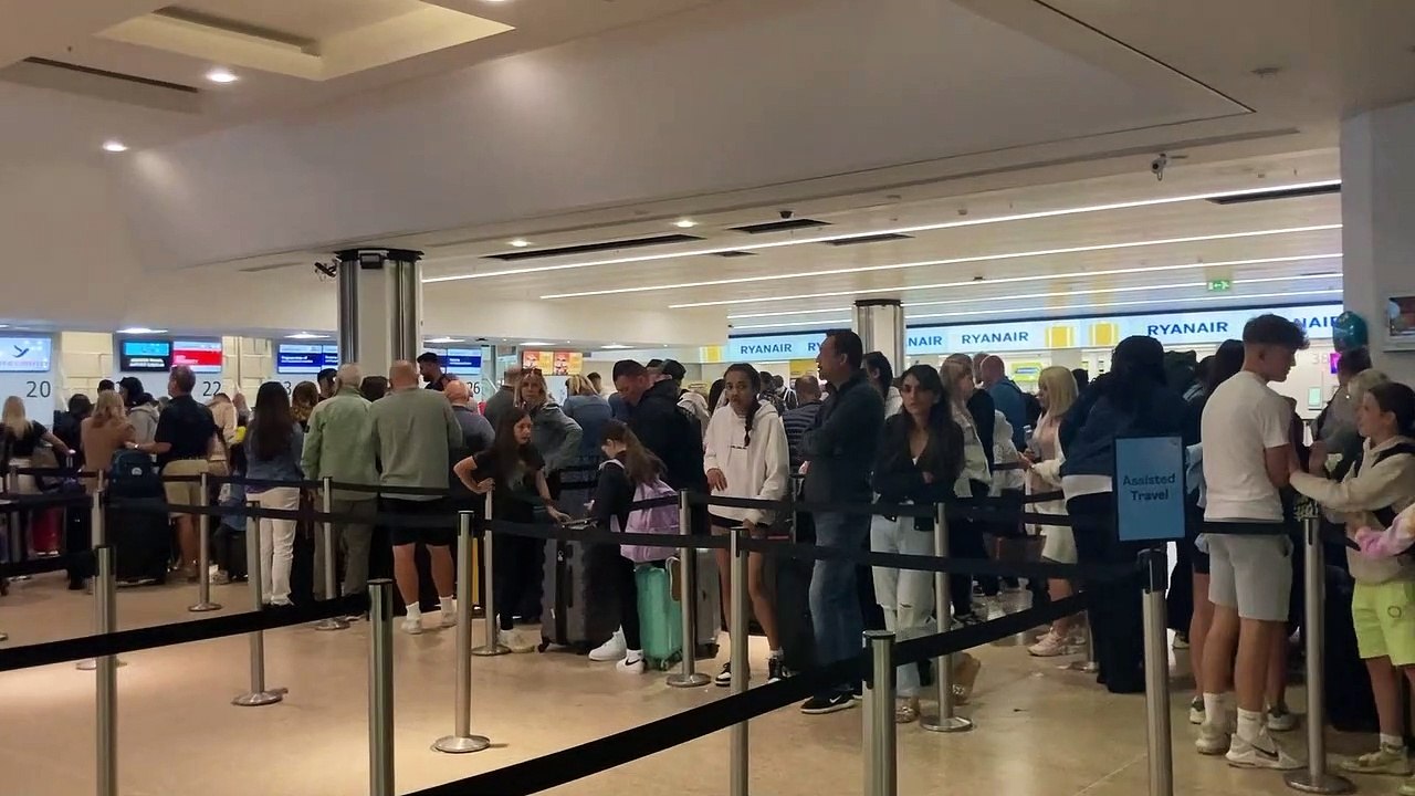 Watch: Queues at Birmingham Airport amid UK air...