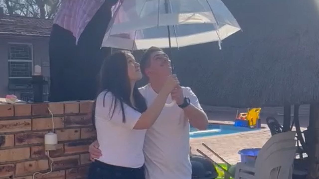 Couple gets their upcoming baby's gender rained over them *Wholesome Gender Reveal*
