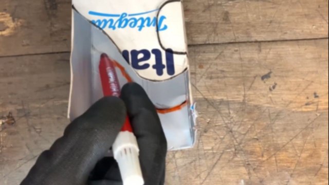 Recycling enthusiast seamlessly turns milk carton into a miniature ambulance