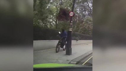 Brazen thief on electric bike snatches woman’s phone outside London’s Ritz Hotel