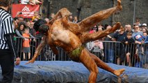 Fighters compete in world gravy wrestling championship