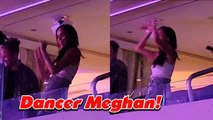 Meghan Markle dances on the VIP stand during Beyoncé's concert