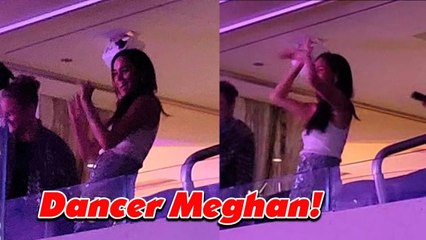 Meghan Markle dances on the VIP stand during Beyoncé's concert