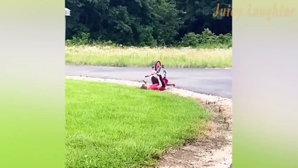 Unplanned Acrobatics: Girl Takes a Backflip Adventure on Three-Wheel Bike!